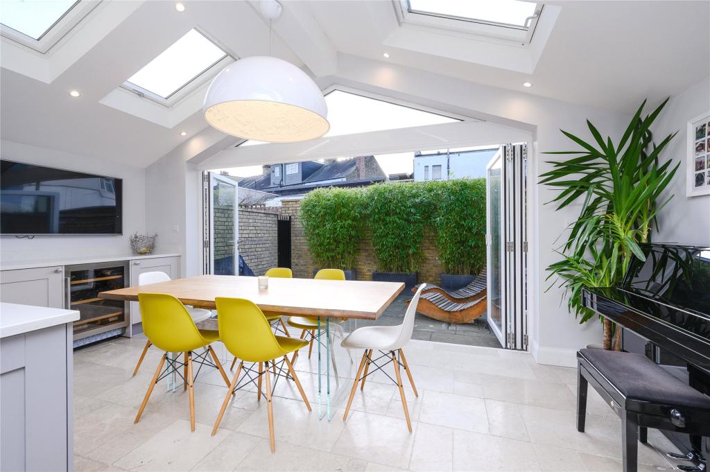 Double-pitched rear extension and interior design in Merton